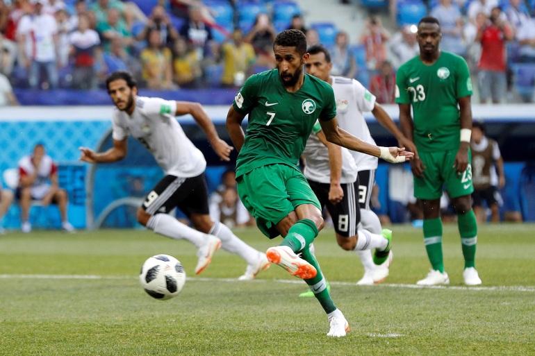 Saudi Arabia's Salman al-Faraj scores a goal from the penalty spot in Volgograd, Russia.