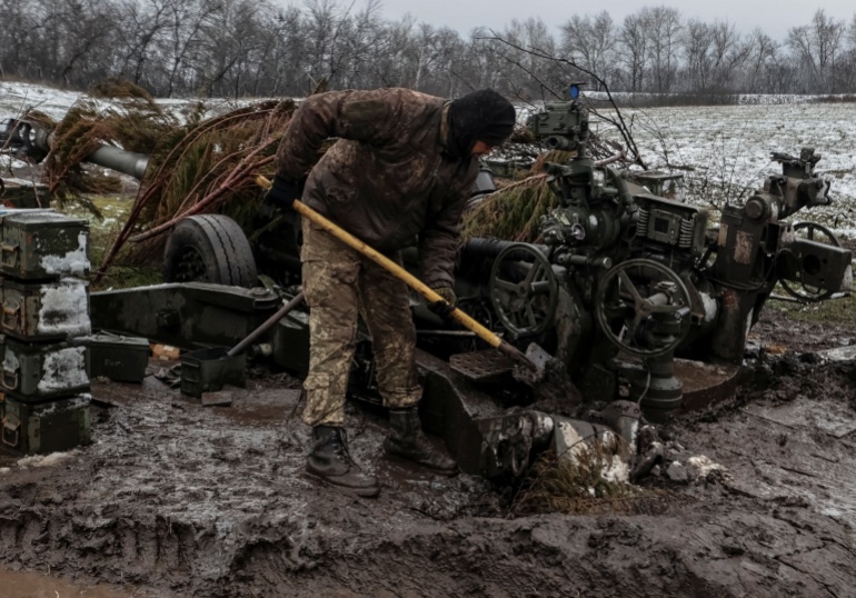 A Ukrainian service member works at an M777 Howitzer at a front line, as Russia's attack on Ukraine continues, in Donetsk Region, Ukraine November 23, 2022