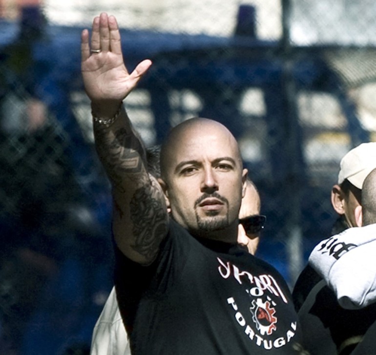 Portuguese Mario Machado performs the Nazi salute during a break in the court session in Monsanto tribunal in Lisbon on October 3, 2008