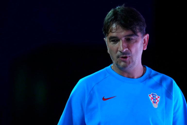Croatia's head coach Zlatko Dalic arrives for a press conference on the eve of the 2022 World Cup semifinal.