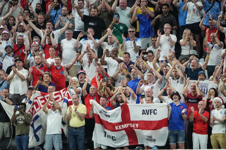 England fans celebrate in the stands.