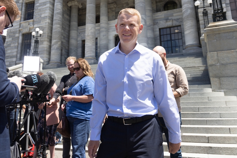 Poised to be New Zealand's new Prime Minister, Chris Hipkins speaks to the media outside Parliament in Wellington on January 21, 2023 [Marty Melville/AFP]